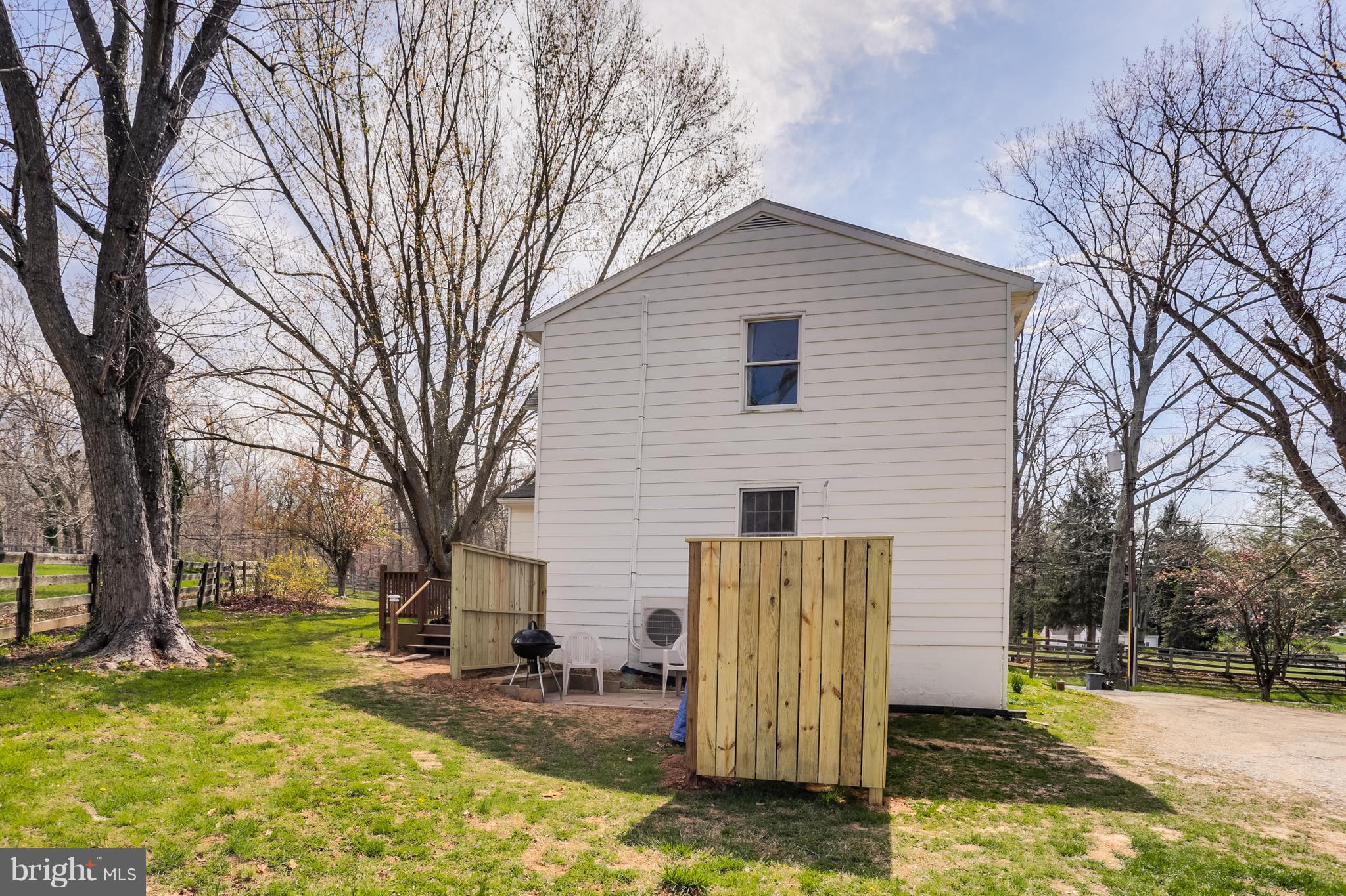 12182 Triadelphia Road Ellicott City, MD 21042 - Photo 4 of 30 Privacy fence shelters the patio