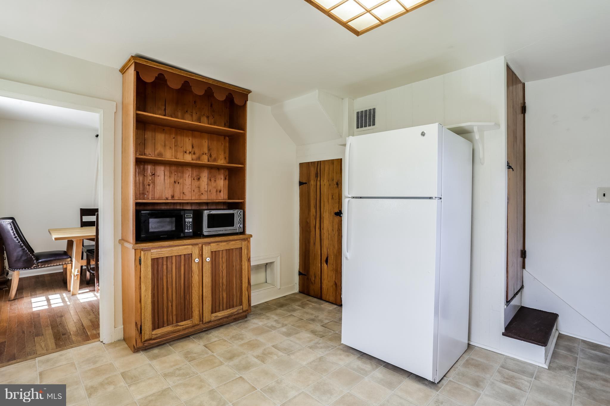 12182 Triadelphia Road Ellicott City, MD 21042 - Photo 7 of 30 Built in storage cabinet