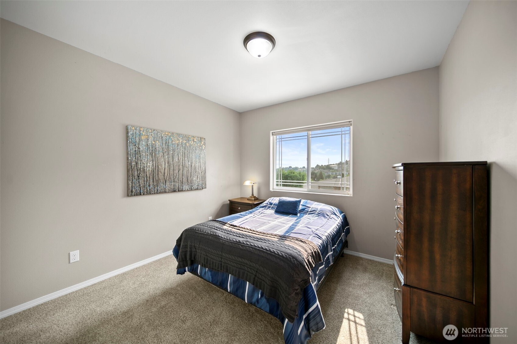 2012 Linville Drive Wenatchee, WA 98801 - Photo 18 of 40 a bedroom with a bed and a window