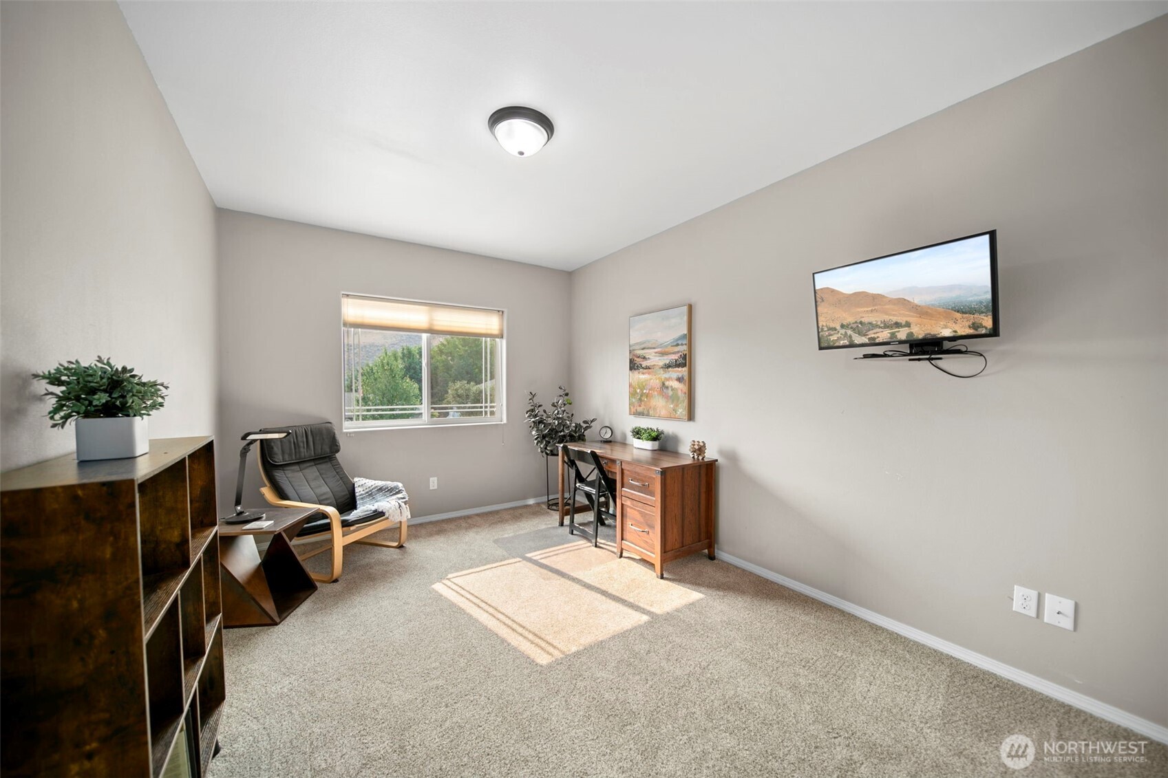 2012 Linville Drive Wenatchee, WA 98801 - Photo 20 of 40 a view of a workspace with furniture and a window