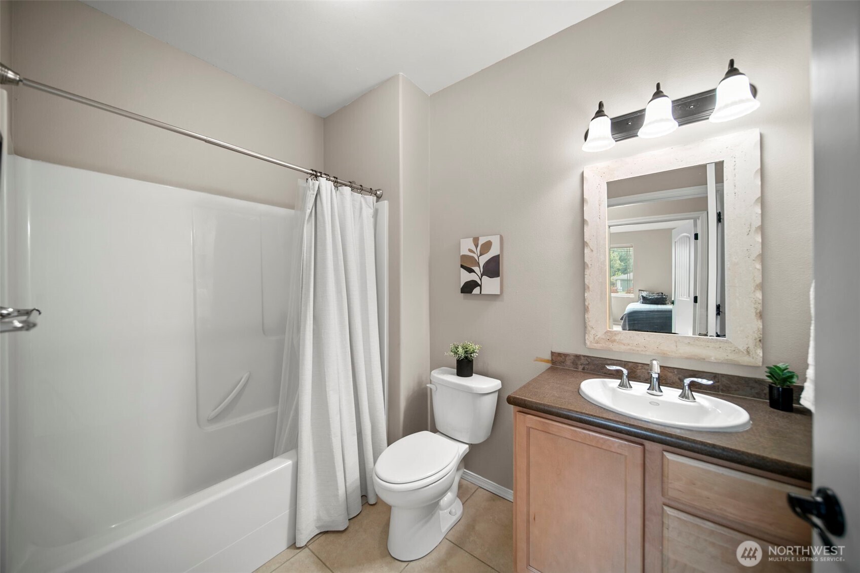 2012 Linville Drive Wenatchee, WA 98801 - Photo 25 of 40 a bathroom with a sink toilet and shower