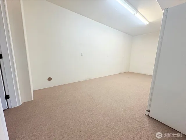 a view of a house with a backyard and a garden