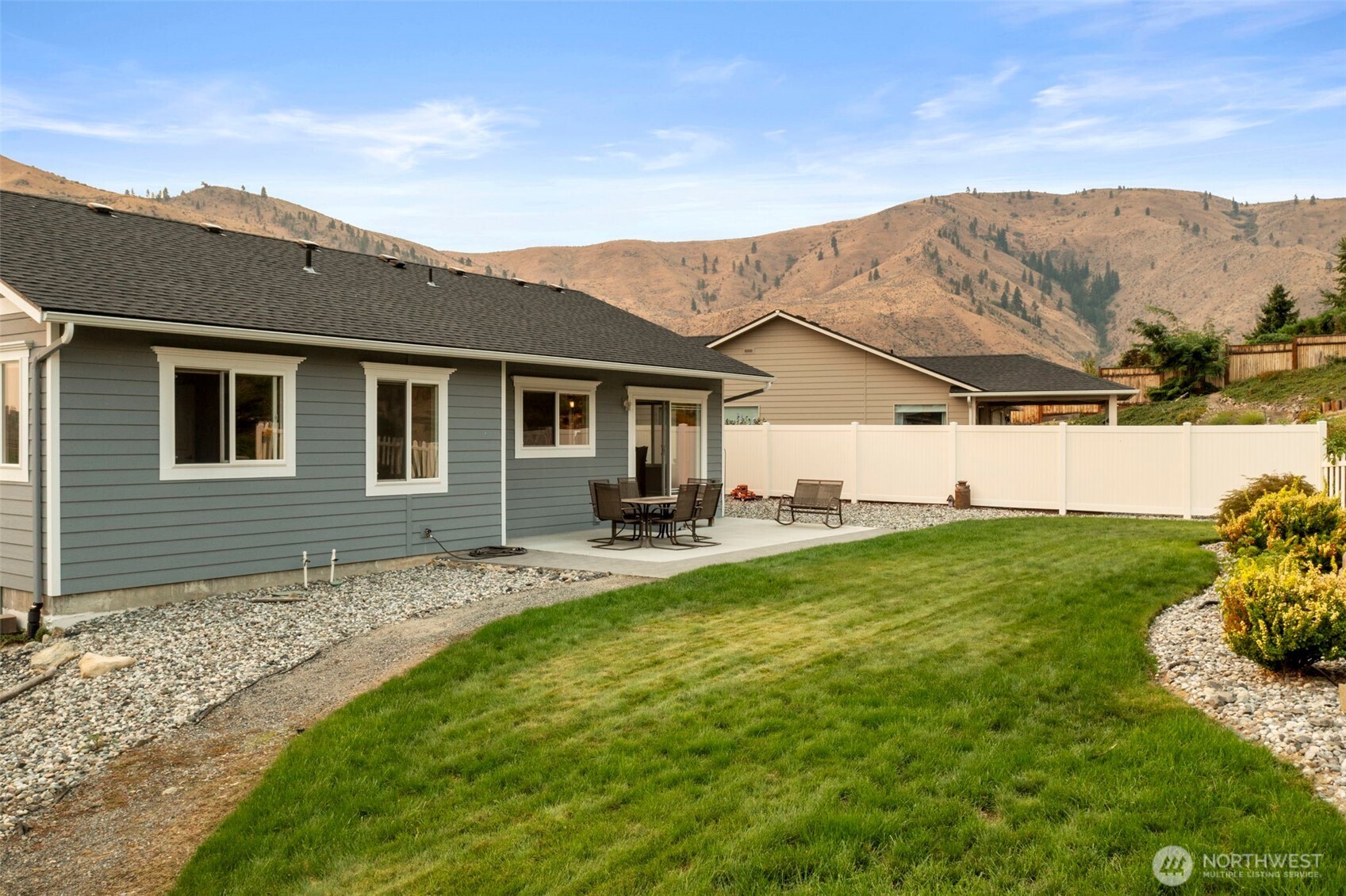 2012 Linville Drive Wenatchee, WA 98801 - Photo 29 of 40 a view of a house with a backyard and a garden