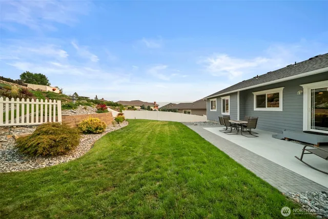 a view of a garden with an outdoor space