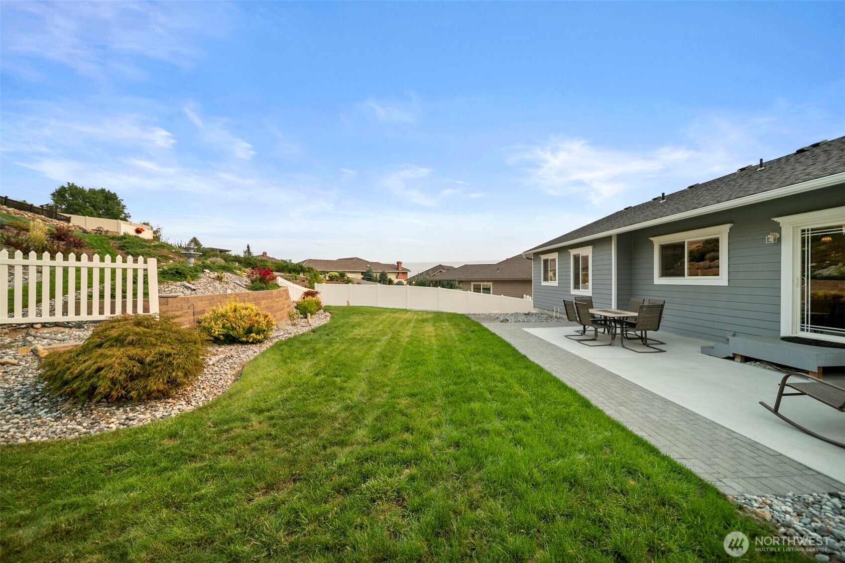 2012 Linville Drive Wenatchee, WA 98801 - Photo 31 of 40 a view of a backyard with swimming pool and furniture
