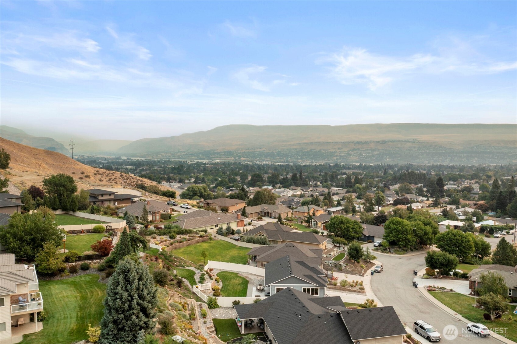 2012 Linville Drive Wenatchee, WA 98801 - Photo 36 of 40 an aerial view of a city with lots of residential buildings