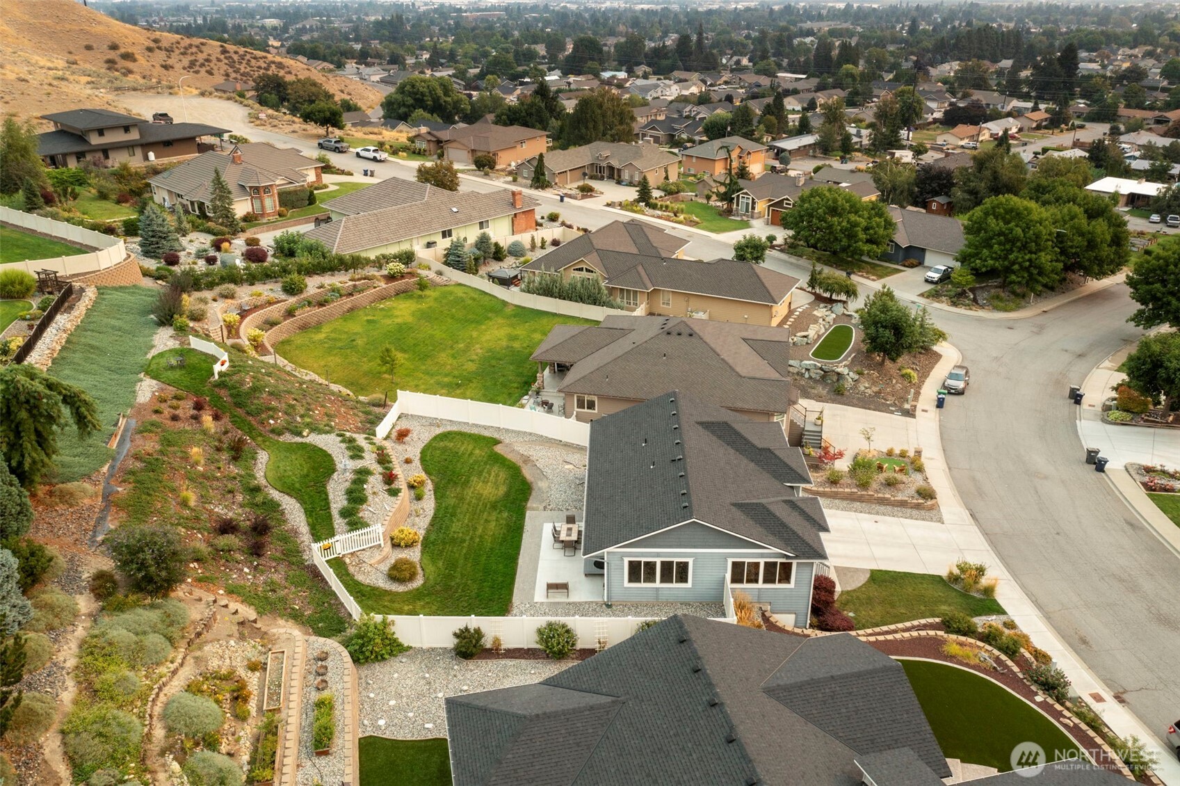 2012 Linville Drive Wenatchee, WA 98801 - Photo 38 of 40 an aerial view of residential houses with outdoor space