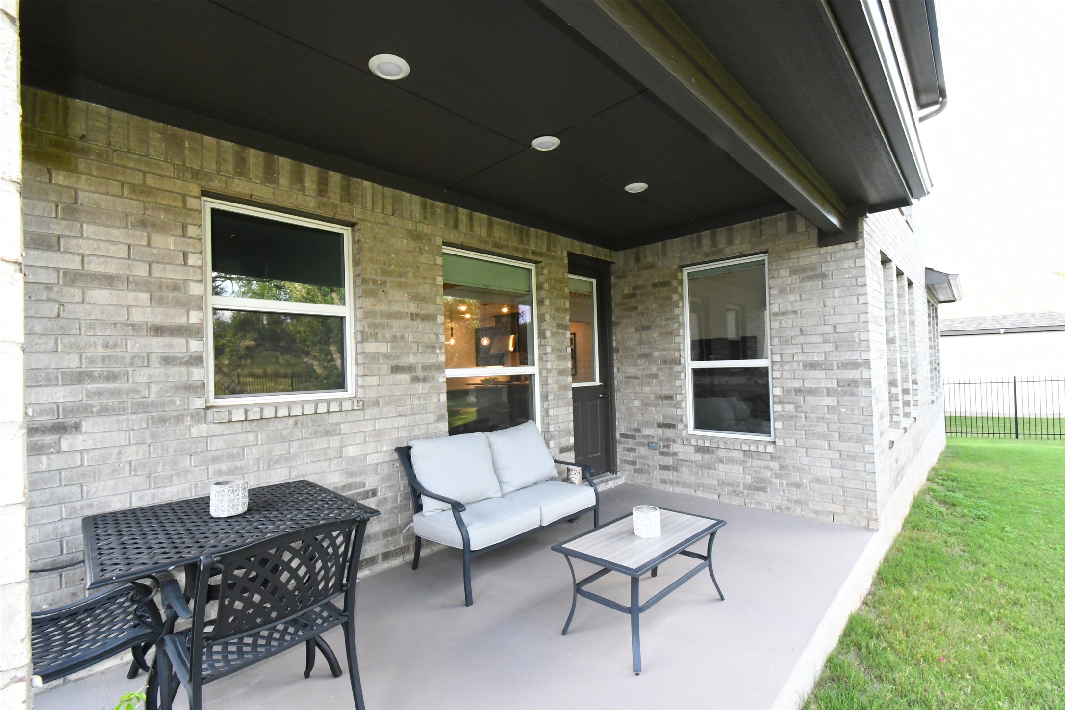 249 Running Bird Road Austin, TX 78737 - Photo 33 of 40 a outdoor living space with furniture and garden view