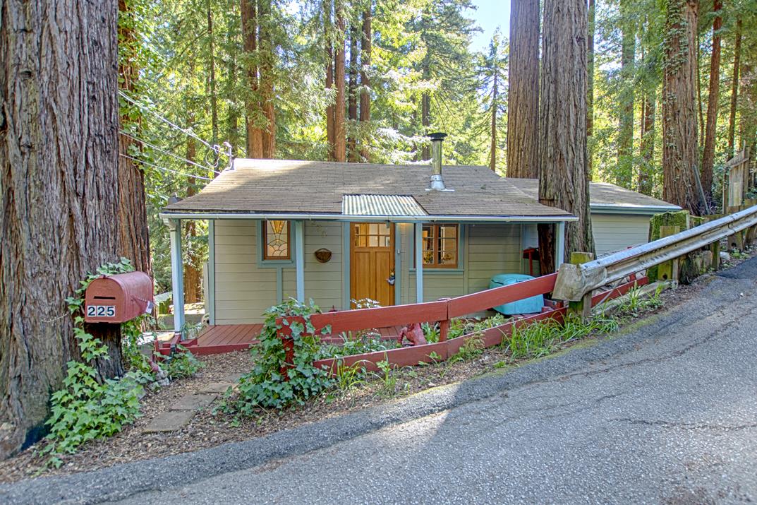 225 Glengarry Road Felton, CA 95018 - Photo 2 of 35 a front view of a house with a yard and potted plants