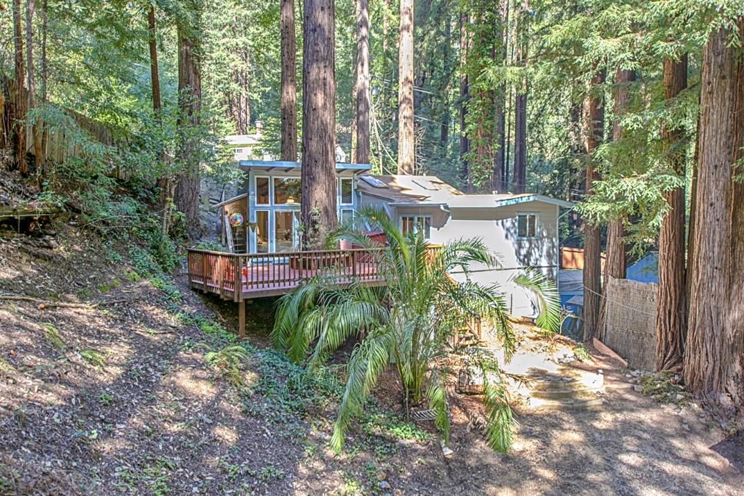 225 Glengarry Road Felton, CA 95018 - Photo 24 of 35 a backyard of a house with barbeque oven table and chairs