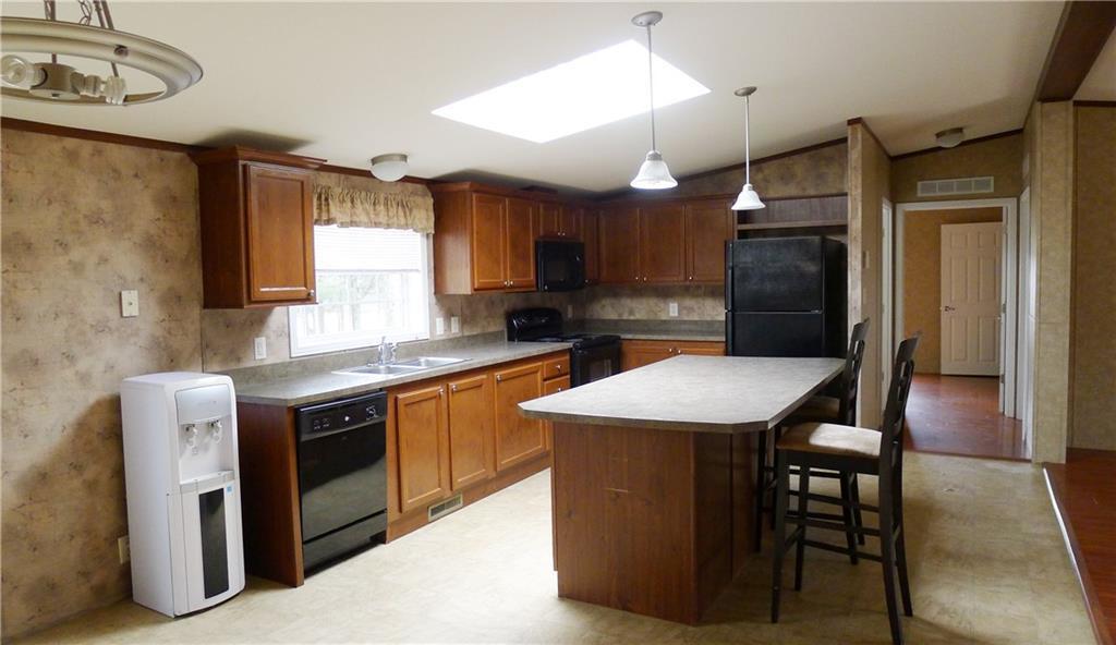 237 Campground Road Livermore Falls, ME 04254 - Photo 5 of 30 Skylights and large windows give...