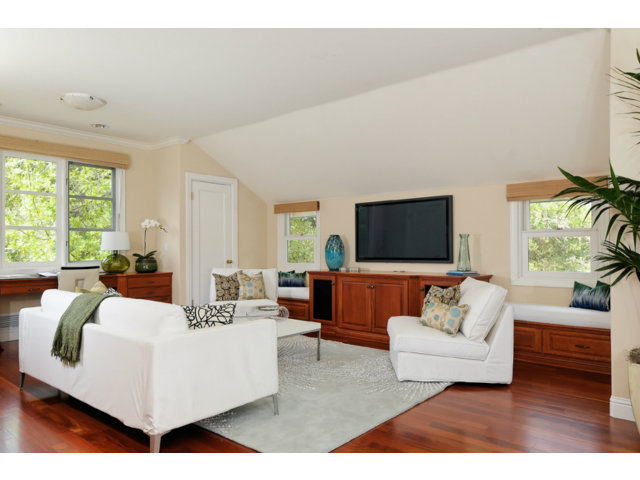 560 Moore Road Woodside, CA 94062 - Photo 8 of 17 a living room with furniture and a flat screen tv