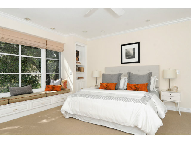 560 Moore Road Woodside, CA 94062 - Photo 10 of 17 a bedroom with a bed and a large window