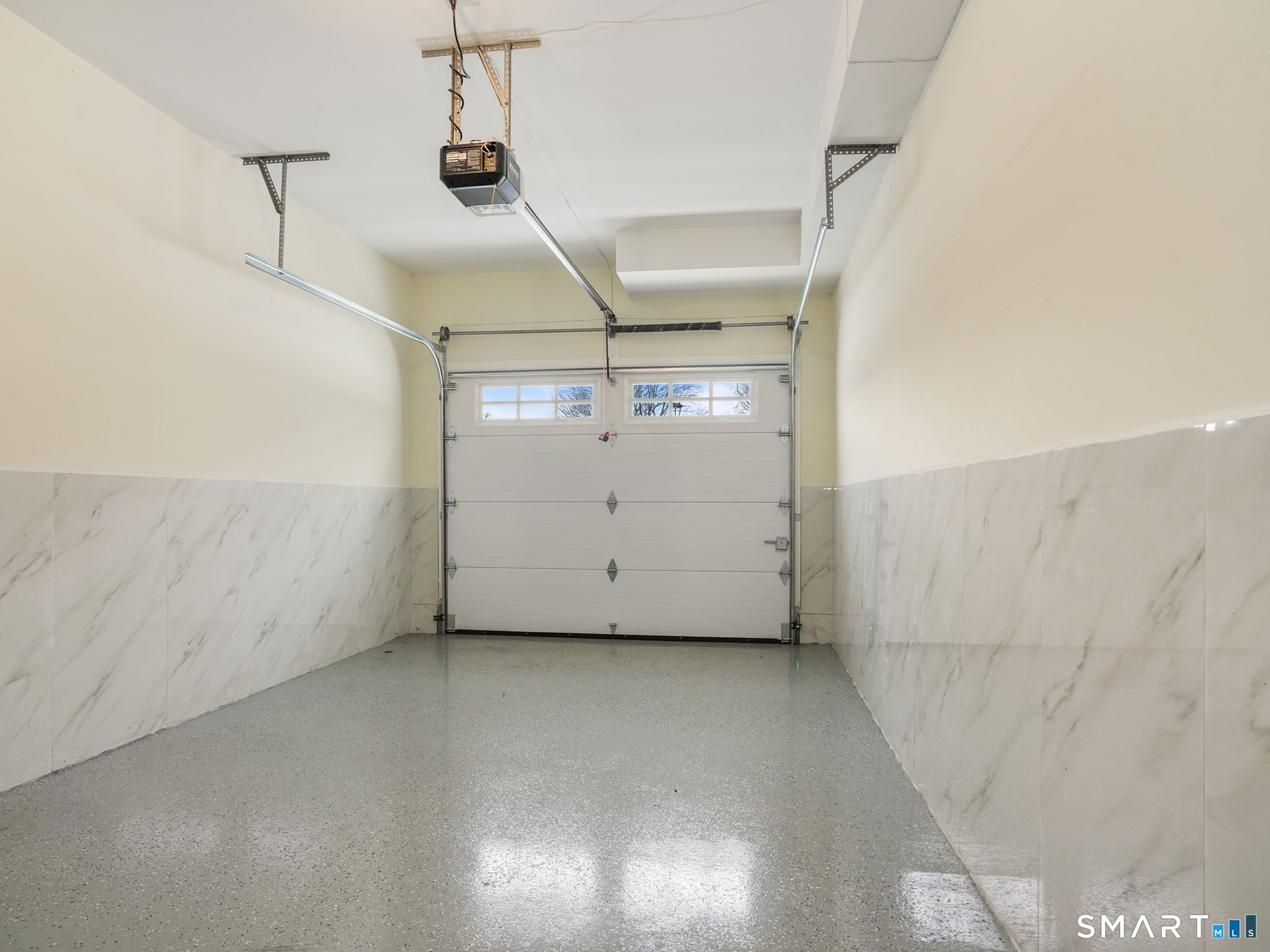 6 Beacon Square, Unit 7 Fairfield, CT 06825 - Photo 8 of 33 a view of a garage