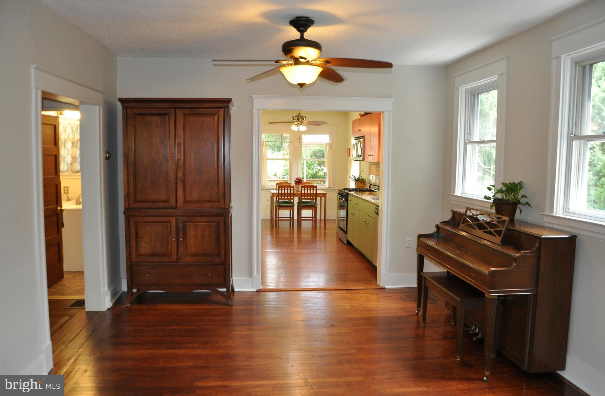 1108 Overbrook Road Baltimore, MD 21239 - Photo 2 of 20 a view of a livingroom with furniture window wooden floor and front door