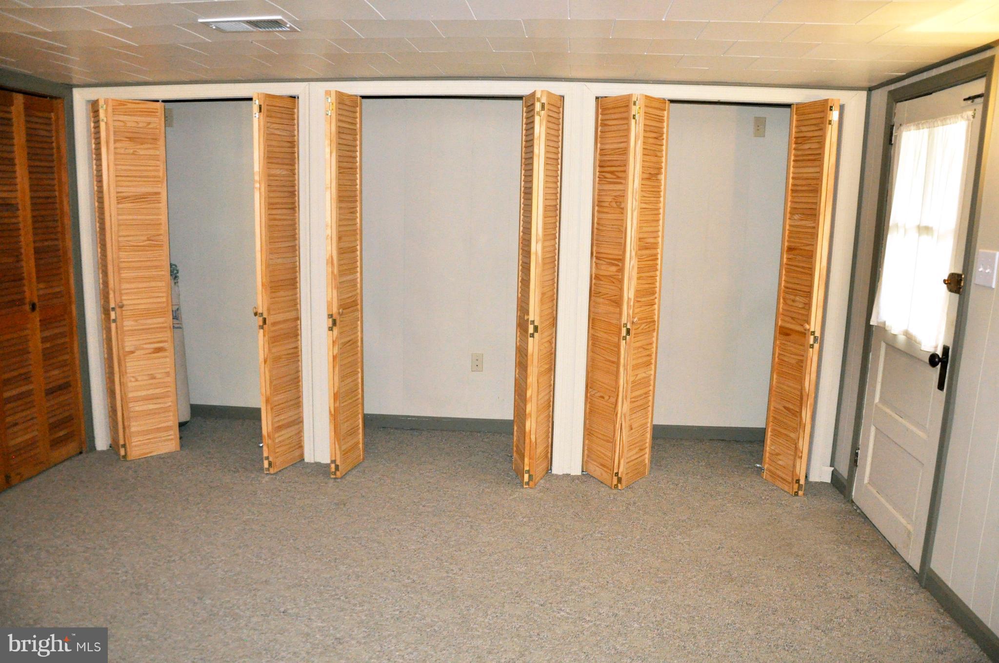1108 Overbrook Road Baltimore, MD 21239 - Photo 12 of 20 a view of an empty room with a window