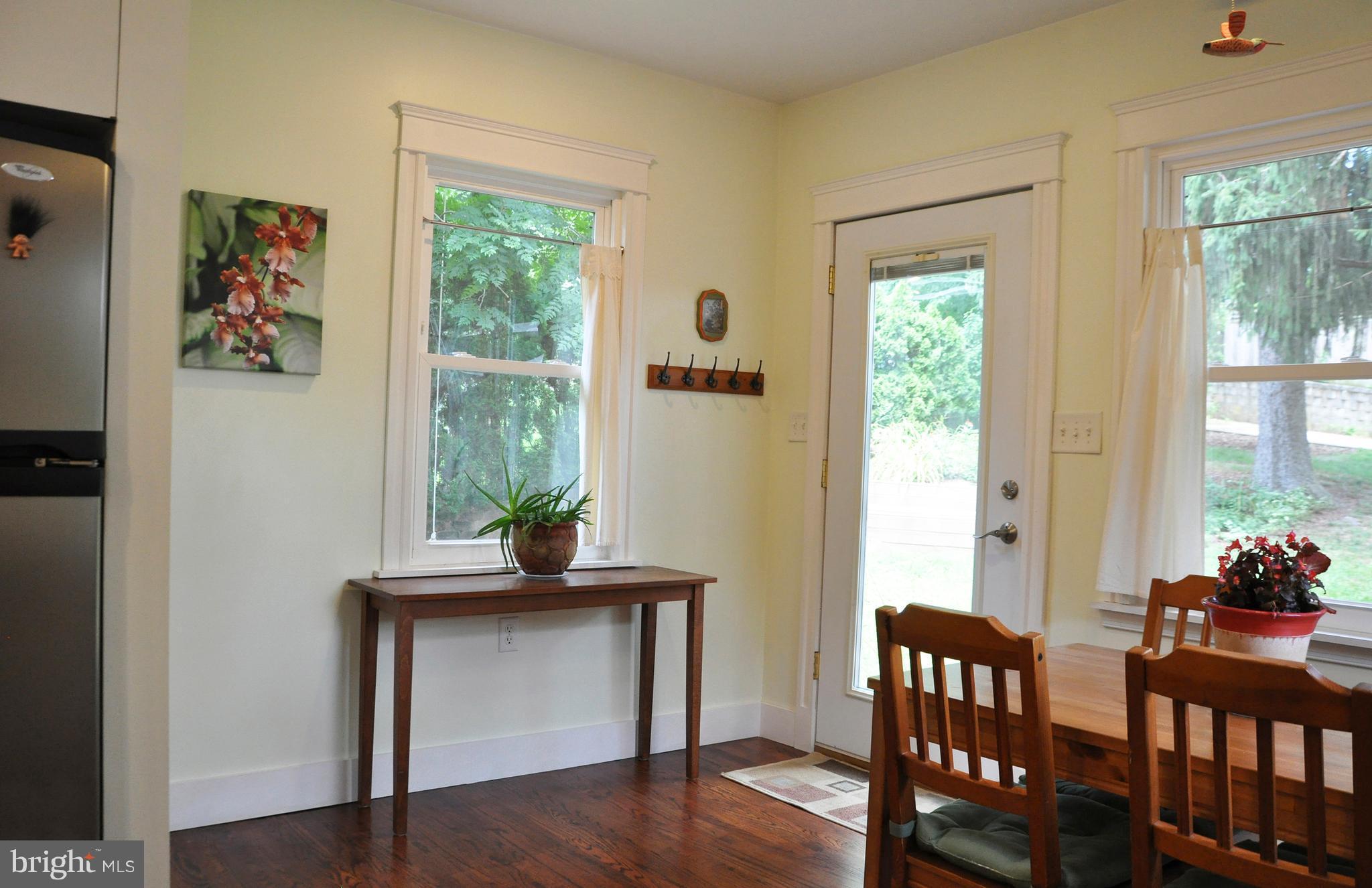 1108 Overbrook Road Baltimore, MD 21239 - Photo 6 of 20 a living room with furniture and a window