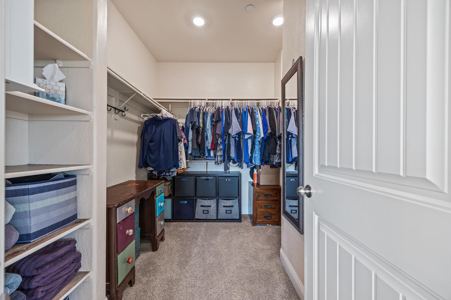 315 Timberline Way Madera, CA 93636 - Photo 56 of 75 a view of walk in closet with clothes