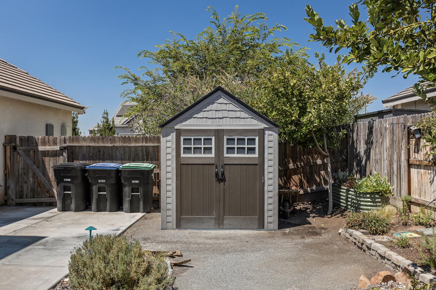 315 Timberline Way Madera, CA 93636 - Photo 63 of 75 a front view of a house with parking space