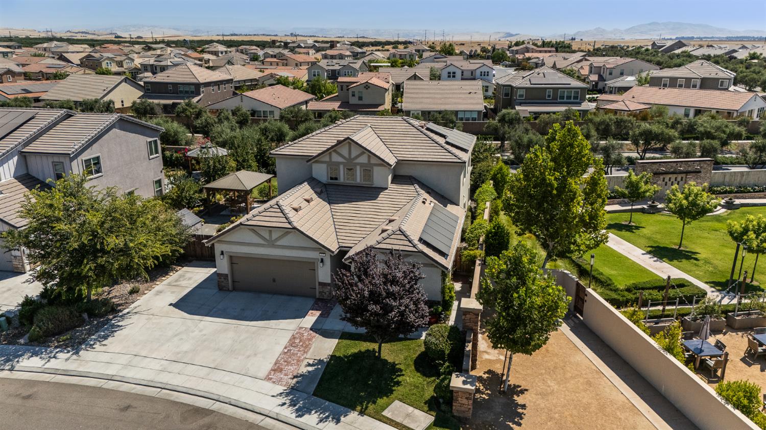 315 Timberline Way Madera, CA 93636 - Photo 65 of 75 an aerial view of a house with a garden