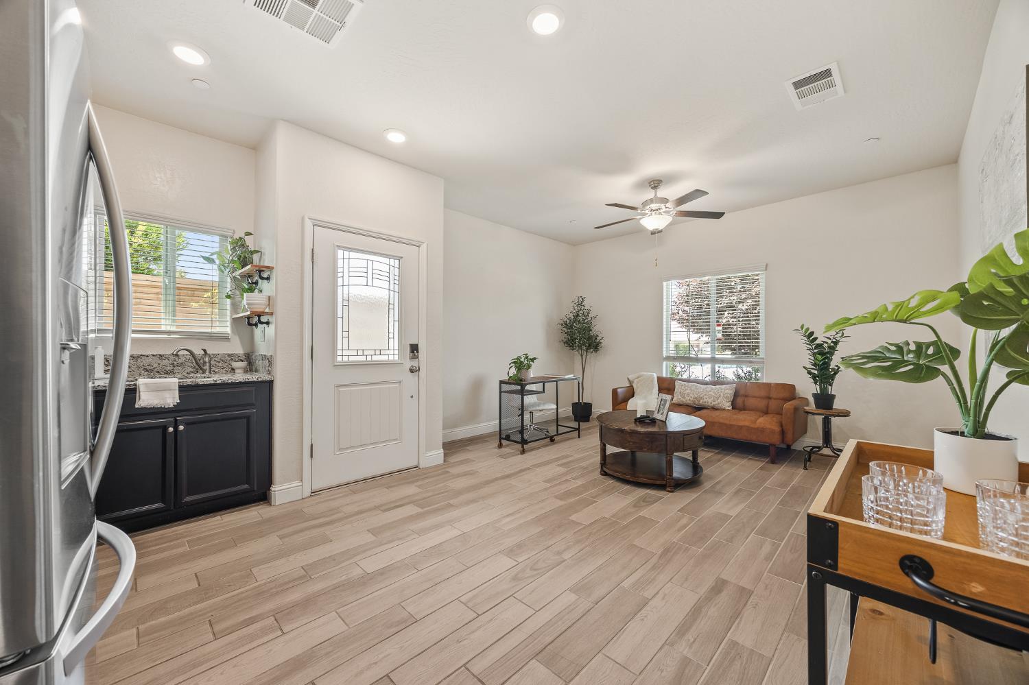 315 Timberline Way Madera, CA 93636 - Photo 7 of 75 a living room with furniture and wooden floor