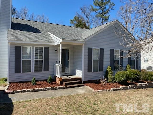2109 Ruddy Road Raleigh, NC 27616 - Photo 2 of 3 a front view of a house with garden