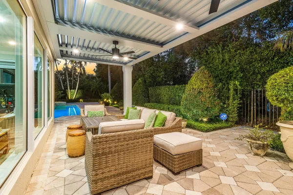 a kitchen with stainless steel appliances granite countertop a stove and a sink