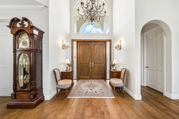a kitchen with stainless steel appliances a refrigerator and a stove top oven