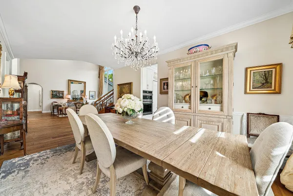 a bedroom with a bed and flat screen tv