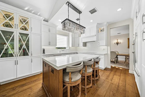 a bedroom with a bed and a view of balcony