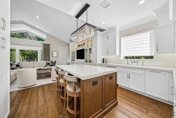 a spacious bathroom with a double vanity sink mirror double and bathtub
