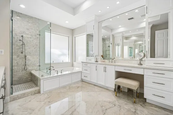 a view of a swimming pool with lounge chair