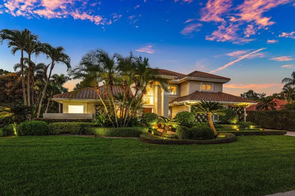 a view of a house with a big yard