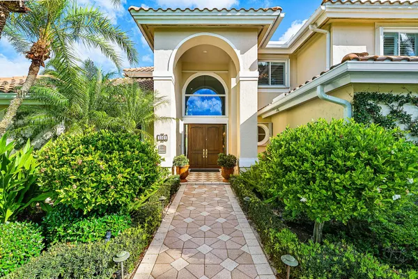 a view of a house with swimming pool