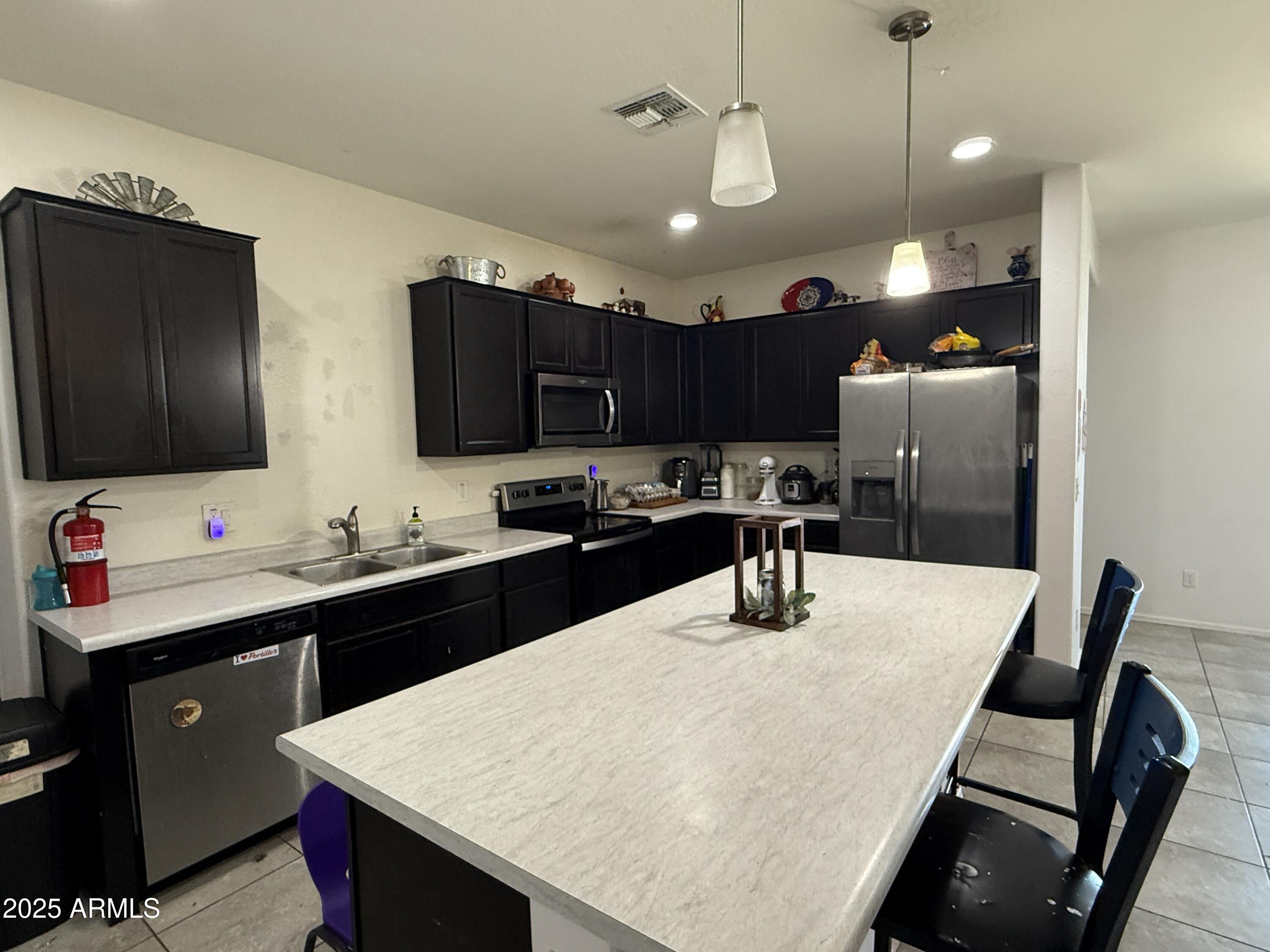 17593 West Daley Lane Surprise, AZ 85387 - Photo 3 of 16 IMG_6127