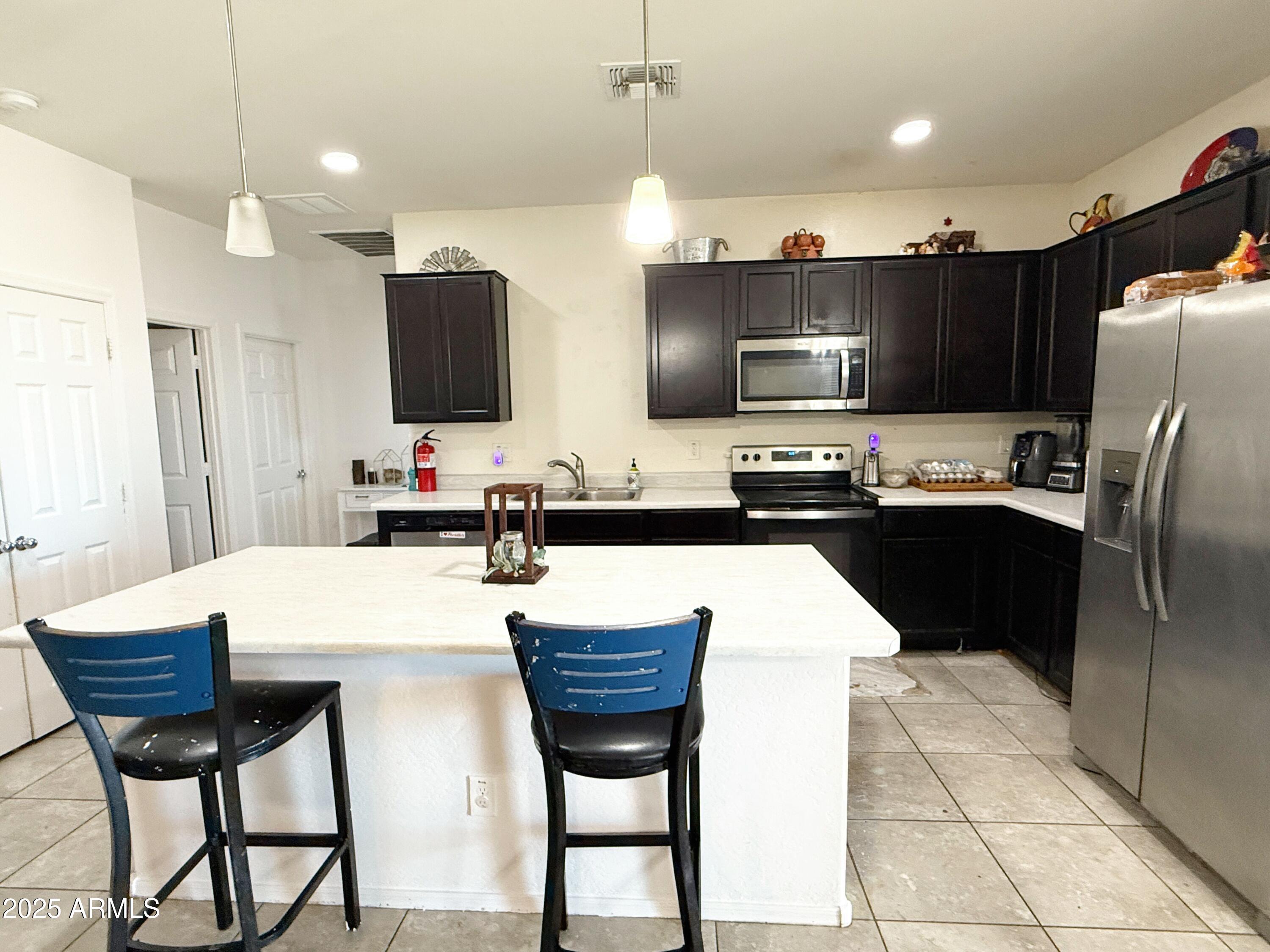 17593 West Daley Lane Surprise, AZ 85387 - Photo 4 of 16 IMG_6129_genErase