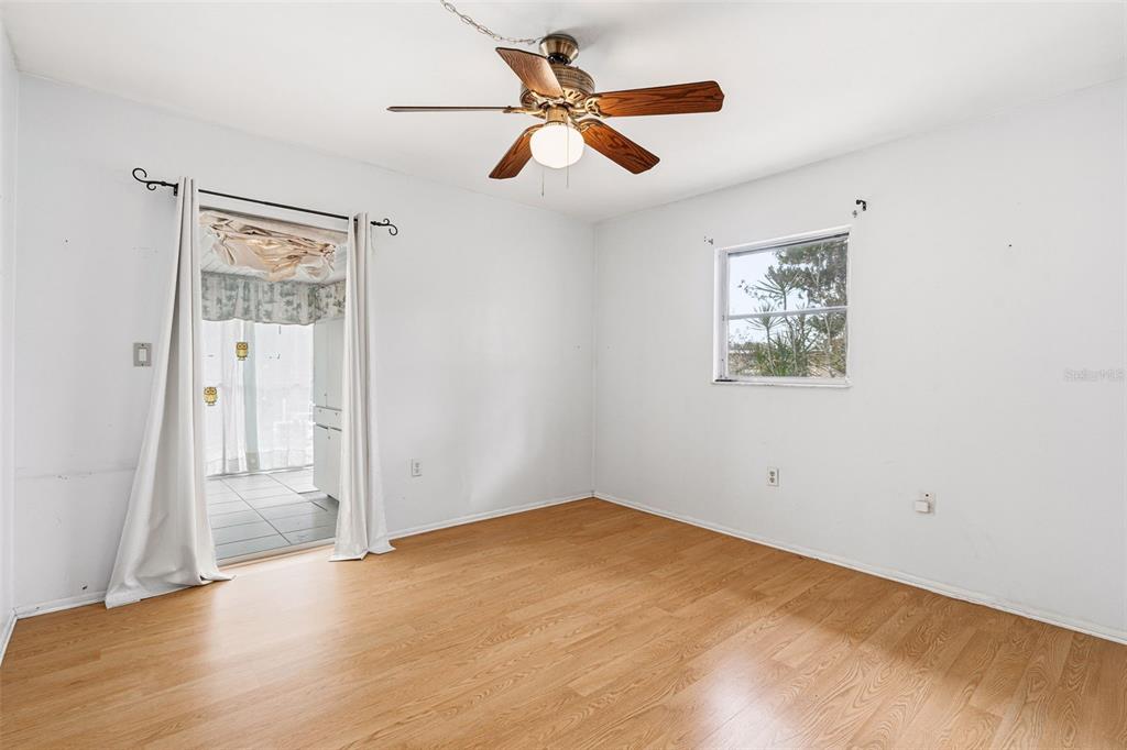 2101 Broad Ranch Drive Port Charlotte, FL 33948 - Photo 25 of 39 wooden floor in an empty room
