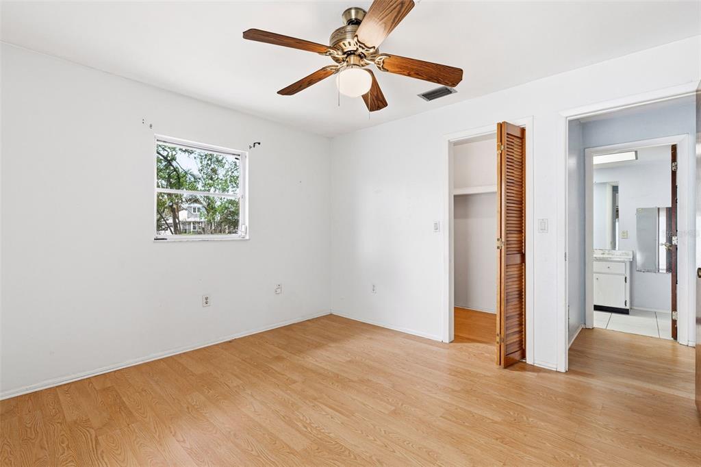 2101 Broad Ranch Drive Port Charlotte, FL 33948 - Photo 27 of 39 an empty room with fan and windows