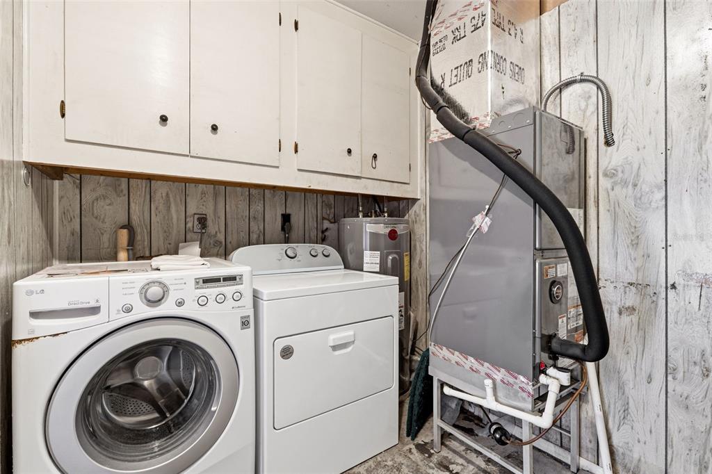 2101 Broad Ranch Drive Port Charlotte, FL 33948 - Photo 31 of 39 a utility room with dryer and washer