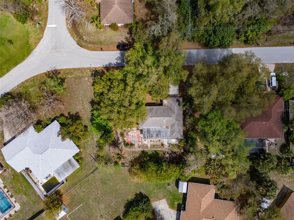 2101 Broad Ranch Drive Port Charlotte, FL 33948 - Photo 36 of 39 an aerial view of a house with outdoor space and a lake view
