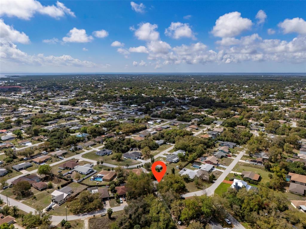 2101 Broad Ranch Drive Port Charlotte, FL 33948 - Photo 38 of 39 an aerial view of residential building with green space