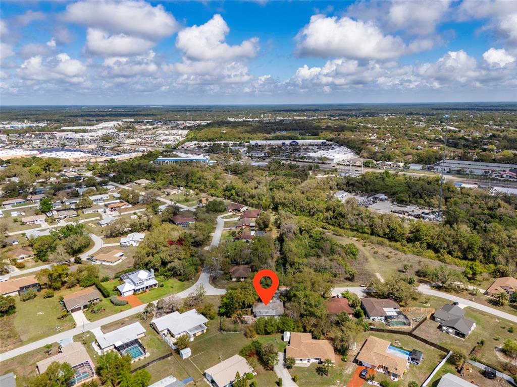 2101 Broad Ranch Drive Port Charlotte, FL 33948 - Photo 39 of 39 an aerial view of residential building with green space