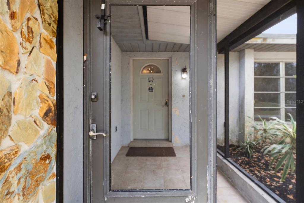 2101 Broad Ranch Drive Port Charlotte, FL 33948 - Photo 4 of 39 a view of front door of house