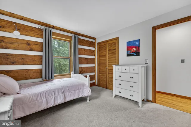 a view of a deck with furniture and wooden floor