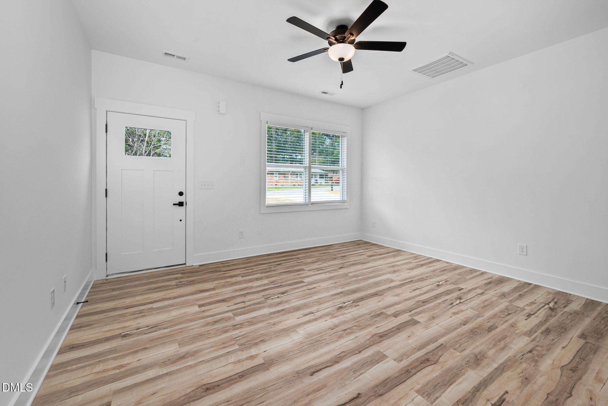 183 Magnolia Drive Roxboro, NC 27573 - Photo 14 of 31 a view of an empty room with a window
