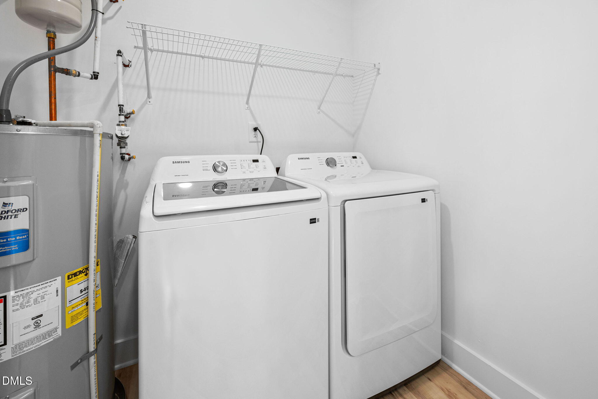 183 Magnolia Drive Roxboro, NC 27573 - Photo 22 of 31 a utility room with dryer and washer