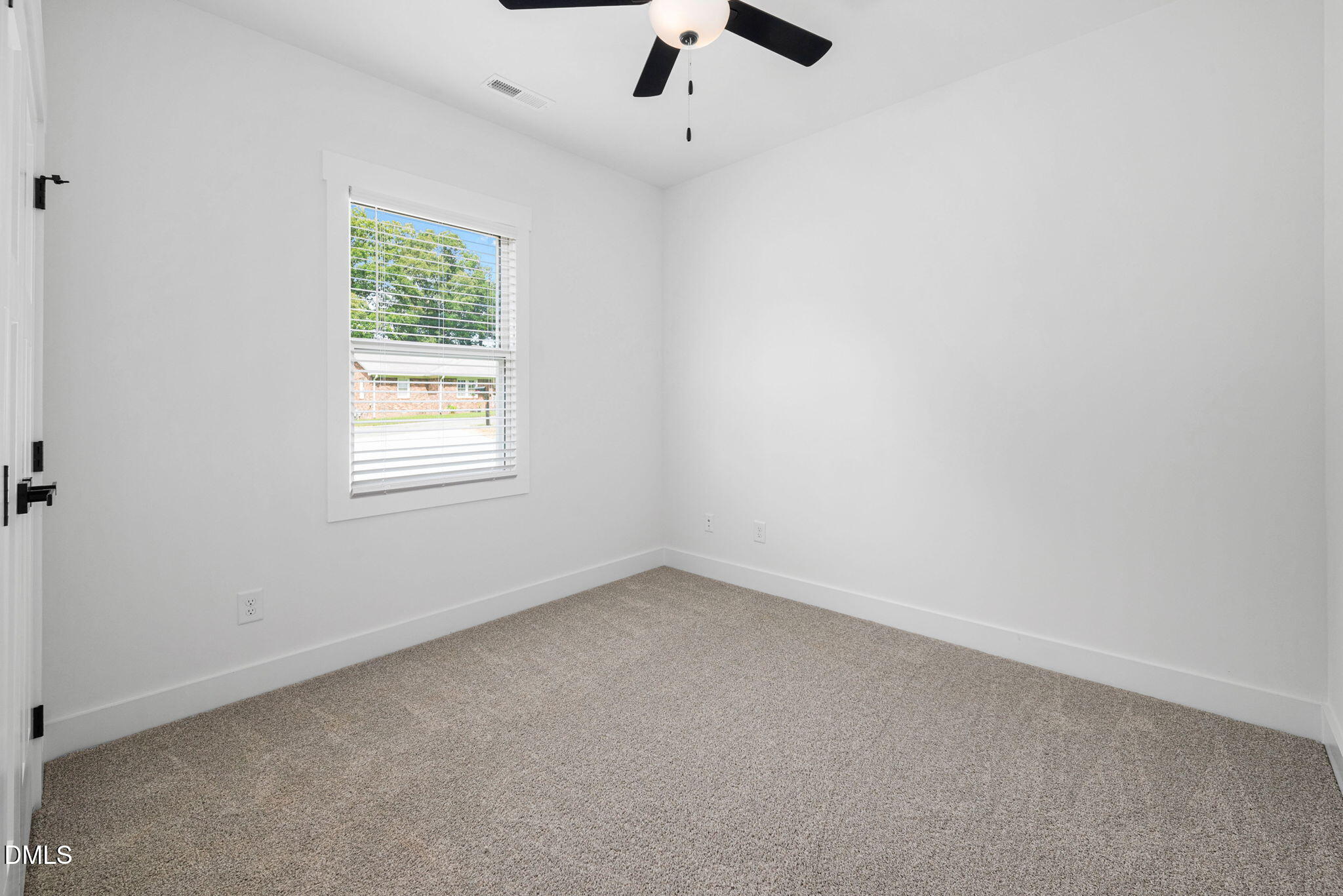 183 Magnolia Drive Roxboro, NC 27573 - Photo 25 of 31 an empty room with a window