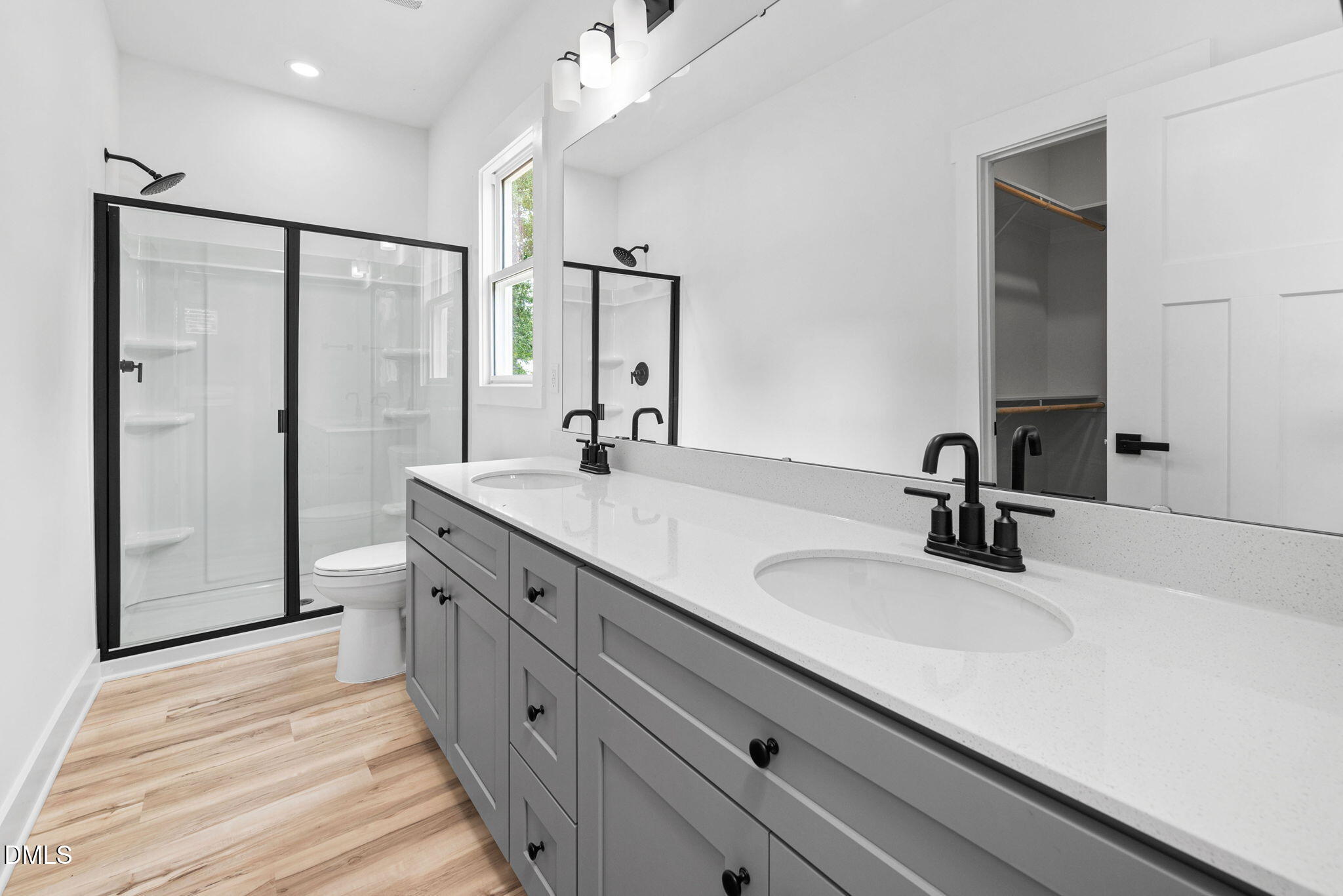 183 Magnolia Drive Roxboro, NC 27573 - Photo 29 of 31 a bathroom with a double vanity sink mirror and double