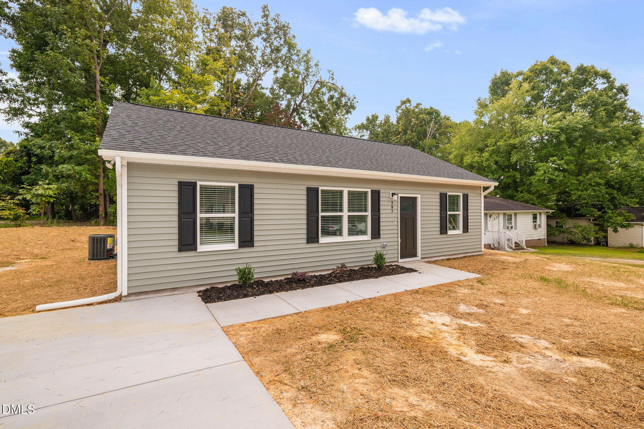 183 Magnolia Drive Roxboro, NC 27573 - Photo 4 of 31 a view of a house with a patio