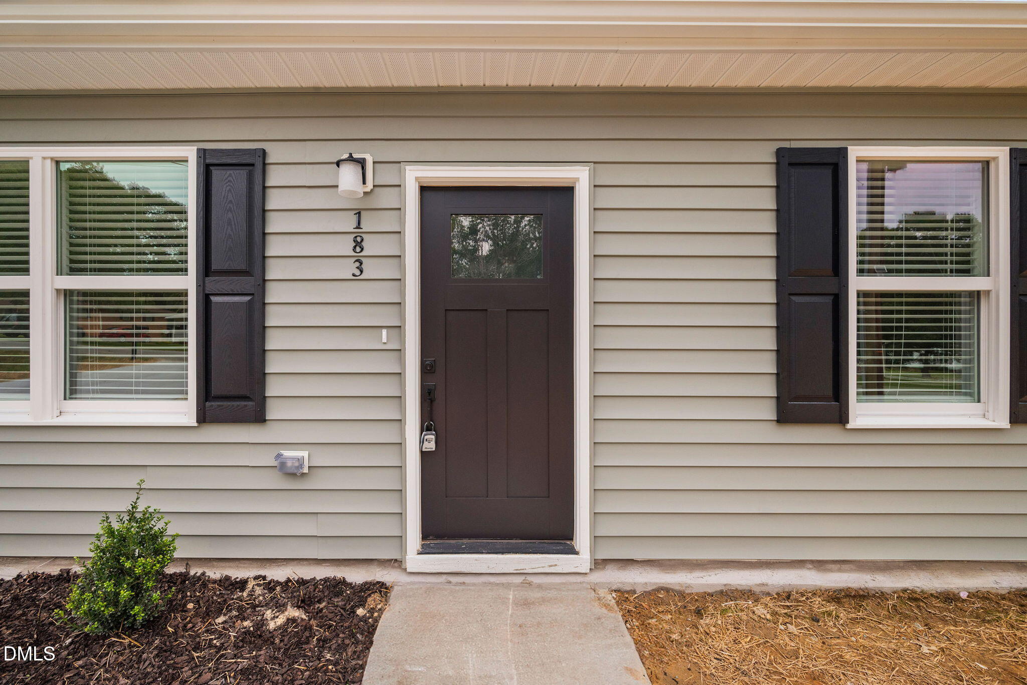 183 Magnolia Drive Roxboro, NC 27573 - Photo 5 of 31 a view of entrance door of the house